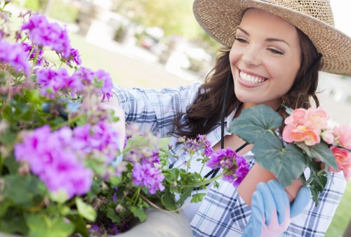 Local Greenford gardeners trimming hedges and maintaining borders